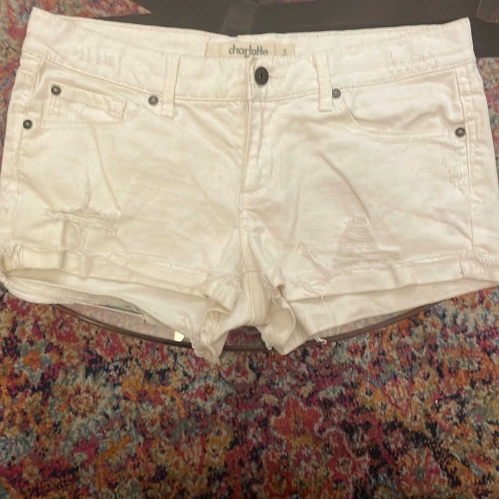 Early 2000s distressed white denim shorts